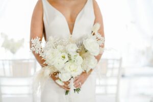 all white wedding bouquet with dried accents
